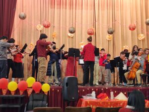 D. Newlin Fell Orchestra performing Mo Li Hua (Jasmine Flower)